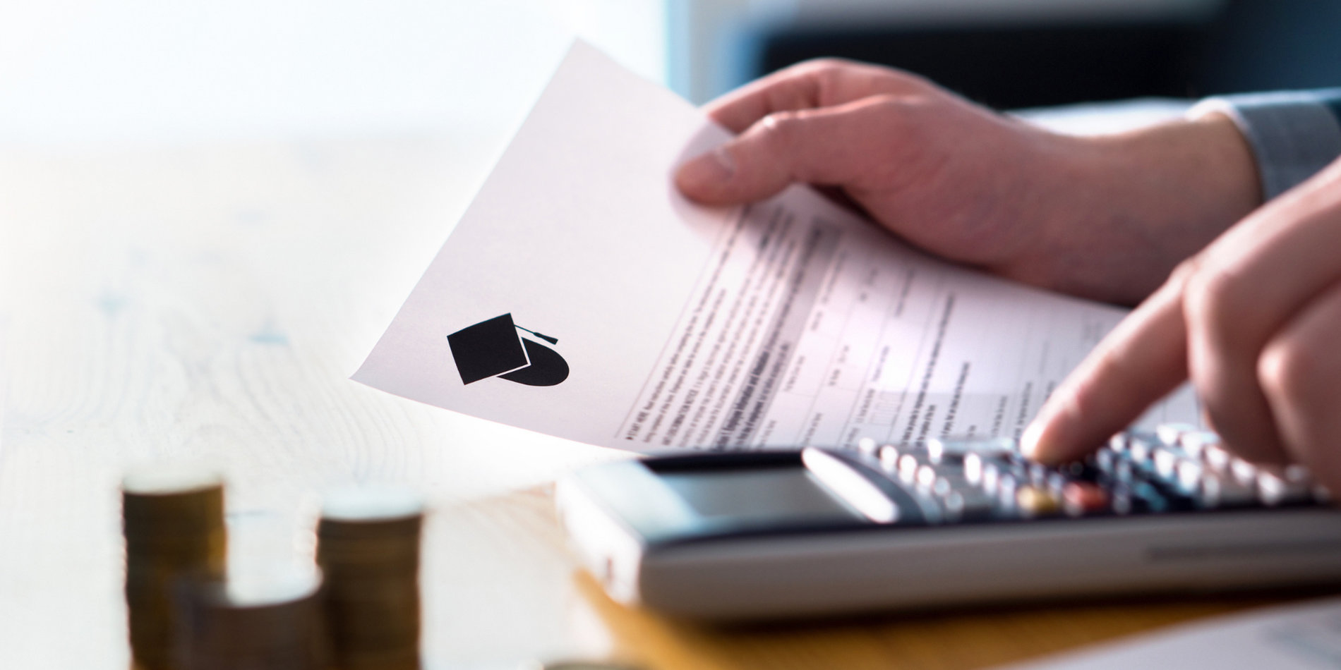 Man counting college savings fund, tuition fee or student loan with calculator.