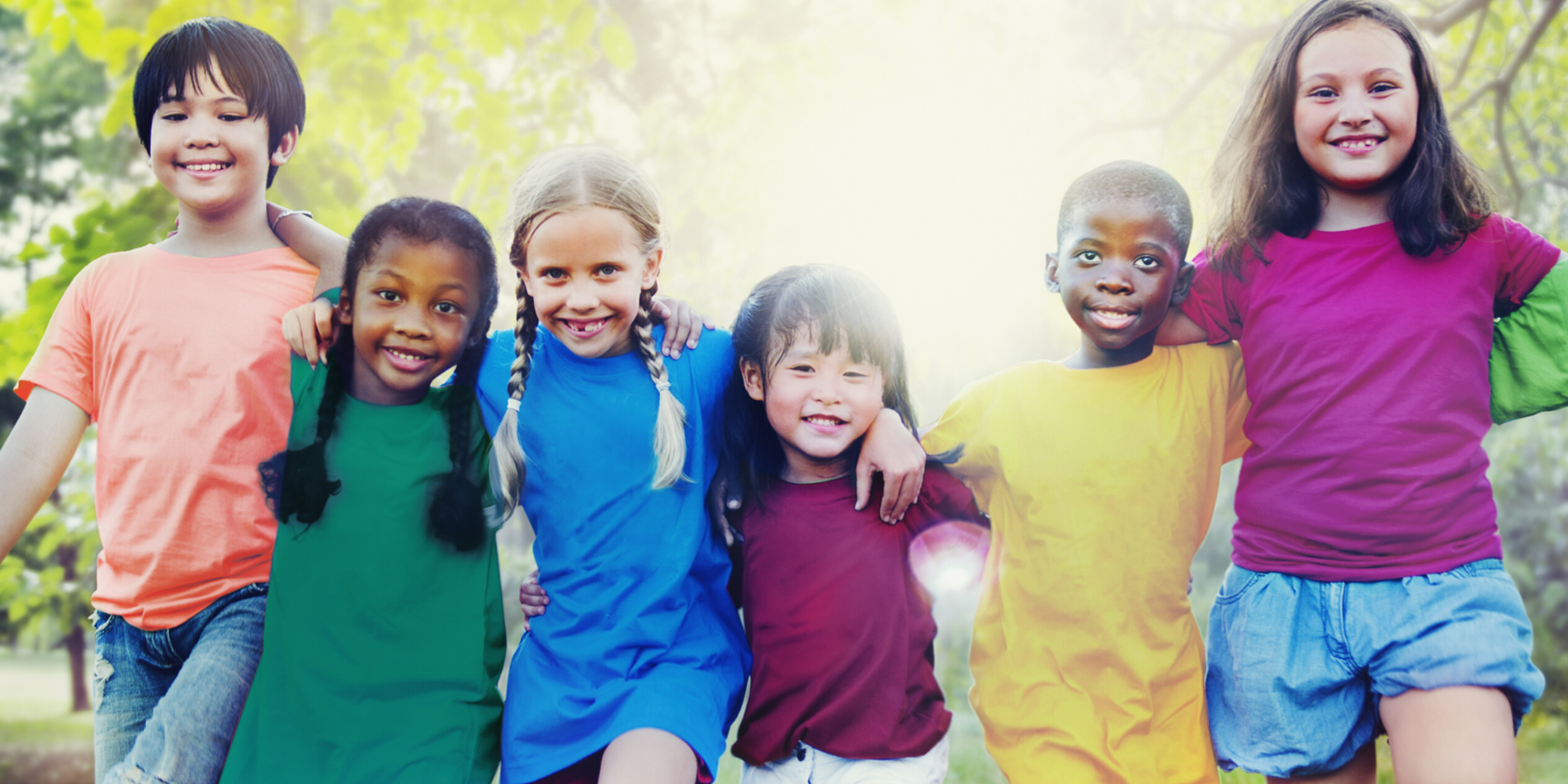 Group of diverse kids playing outdoors