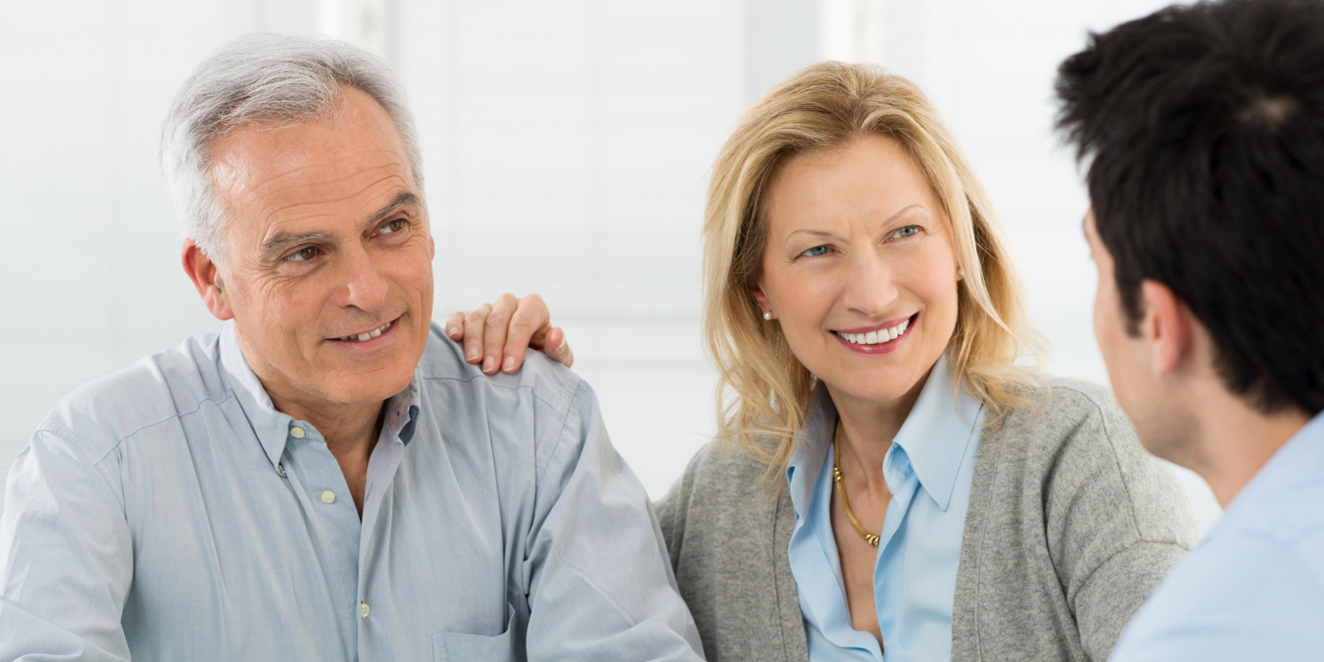 Senior Couple Talking With A Consultant