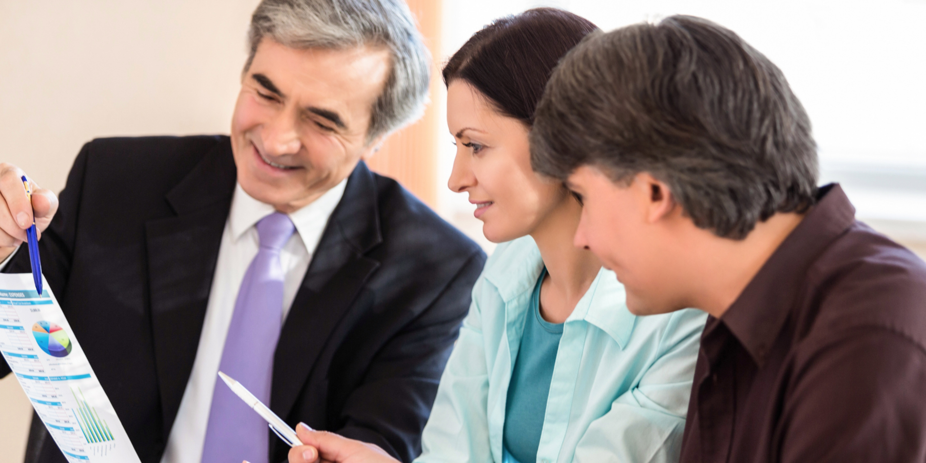Couple having a financial advising meeting