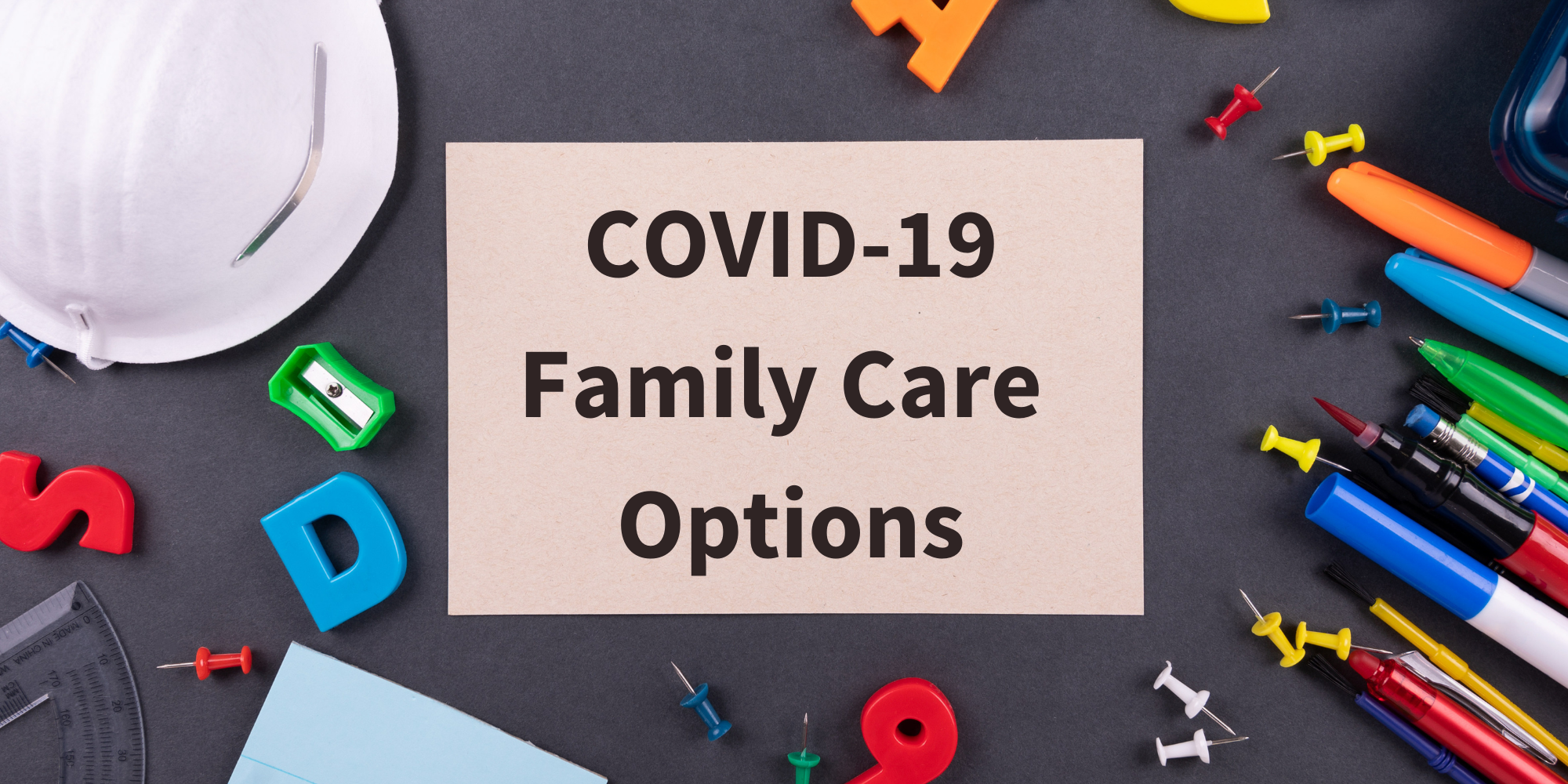 Table with a mask, letter magnets, and pens around a center piece of paper that says "COVID-19 Family Care Options"
